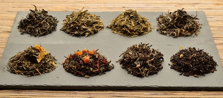 Photo of various kinds of tea Placed on slabs of slateの写真素材
