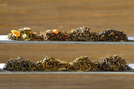 Photo of various kinds of tea Placed on slabs of slateの写真素材
