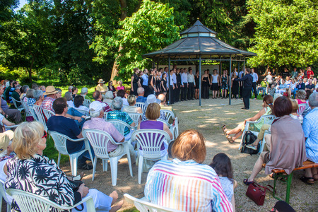 BONN, GERMANY - JULY 7  Jazz choir of University of Bonn sings during a concert in local botanical garden on July 7, 2013 in Bonn, Germany のeditorial素材