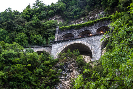 Mountain road at the coast of Lugano lake, Switzerlandの写真素材