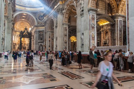 ROME, ITALY - JUNE 25: Tourists visit St. Peter's Basilica in Vatican on June 25, 2014. St. Peter's Basilica is one of the main tourist attractions of Rome.のeditorial素材
