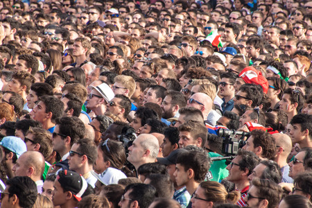 ROME, ITALY - JUNE 24: Crowd of football fans in Rome, Italy on June 24, 2014. They watch the match Italy-Uruguay of the World Cup.のeditorial素材