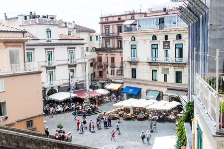 AMALFI, ITALY - JUNE 28, 2014: Tourists visit a picturesque town Amalfi, Italy. Amalfi is included in the UNESCO World Heritage Sites.のeditorial素材