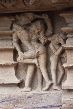 Detail of an erotic carving on a temple in Khajuraho, Madhya Pradesh, India.のeditorial素材
