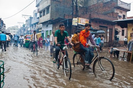 VARANASI, INDIA - AUGUST 11: Flooded street on August 11, 2011 in Varanasi, Uttar Pradesh, India. India's monsoon rains were 14 percent above normal in the week to Aug. 10, 2011.のeditorial素材