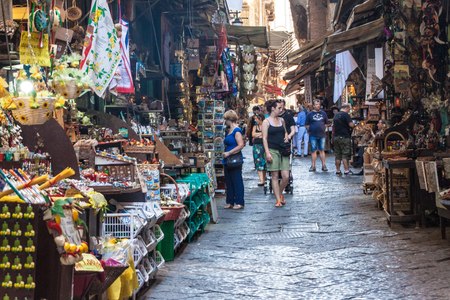 NAPLES, ITALY- JUNE 26, 2014: Street in historic center of Naples, Italy. Naples historic city center is the largest in Europe, and is listed by UNESCO as a World Heritage Site.のeditorial素材