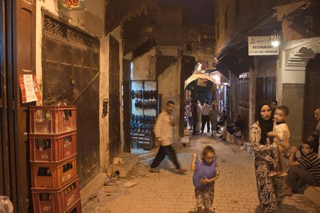 FES, MOROCCO - JULY 27: People on a street market on July 27, 2010 in Fes, Morocco. Fes center is listed in UNESCO and it is the largest preserved medieval city in the world. Also it's one big market.のeditorial素材