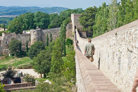 GIRONA, SPAIN - AUGUST 17: Fortification walls on August 17, 2010 in Girona, Catalonia, Spain. It is located 99 km northeast of Barcelona. Girona is one of the major Catalan cities.のeditorial素材