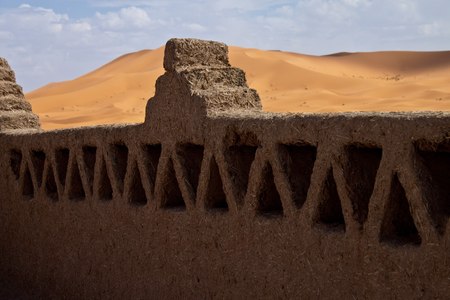 wall of a kasbah in desert の写真素材