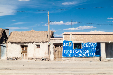JULACA, BOLIVIA - APRIL 16, 2015: Election posters on a house in a small village Julaca, Bolivia. This village is located in a desert of southwestern Bolivia near salt plains of Uyuni.のeditorial素材