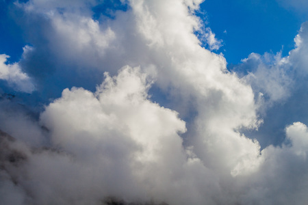 Mountain behind clouds