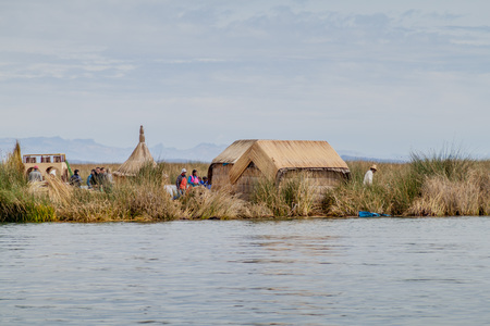 TITICACA, PERU - MAY 15, 2015: One of Uros floating islands, Titicaca lake, Peruのeditorial素材