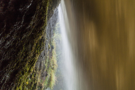 Pailon del Diablo (Devil's Cauldron) waterfall as viewed from behind, Ecuadorの写真素材
