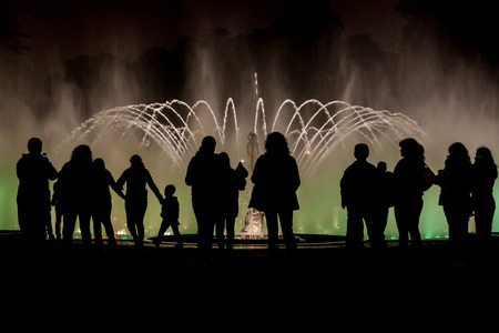 People visit El Circuito Magico del Agua - park with a series of different fountains in Lima, Peru.の写真素材