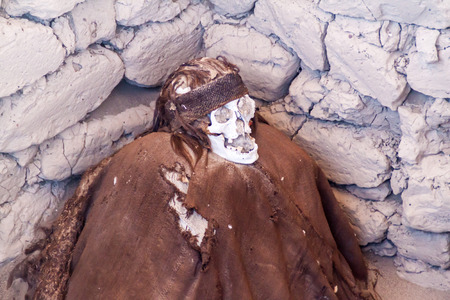 Preserved mummy in a tomb of Chauchilla cemetery in Nazca, Peruの写真素材
