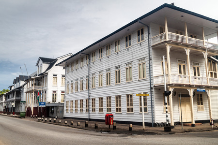 PARAMARIBO, SURINAME - AUGUST 5, 2015: Street with old colonial buildings in Paramaribo, capital of Suriname.のeditorial素材
