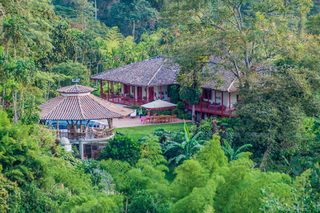 MANIZALES, COLOMBIA - SEPTEMBER 5, 2105: Main building of Hacinda Venecia coffee farm hotel.のeditorial素材