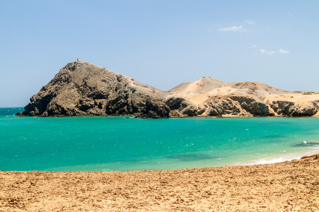 Coast of La Guajira peninsula in Colombia. Pilon de Azucar hill in the background.