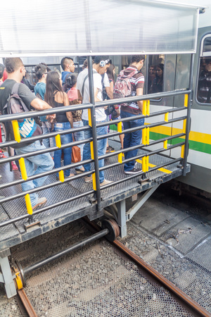 MEDELLIN, COLOMBIA - SEPTEMBER 1, 2015: Commuters at San Antonio station of Medellin metro.のeditorial素材
