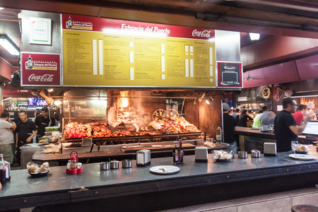 MONTEVIDEO, URUGUAY - FEB 19: Barbecue in restaurant in Mercado del Puerto in Montevideo, Uruguayのeditorial素材