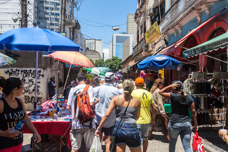 RIO DE JANEIRO, BRAZIL - JANUARY 28, 2015: People walk on a street in downtown of Rio de Janeiro, Brazilのeditorial素材