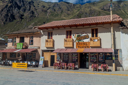 OLLANTAYTAMBO, PERU - MAY 20, 2015: Houses on Plaza de Armas in Ollantaytambo, Sacred Valley of...