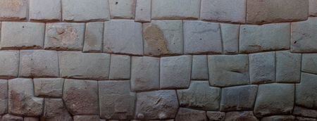 Detail of Inca's perfect stonework. Wall of former palace of Inca Roca in Cuzco, Peru.の写真素材