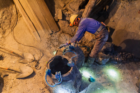 POTOSI, BOLIVIA - APRIL 20, 2015: Bolivian miner works inside Cerro Rico mine in Potosi, Bolivia.のeditorial素材