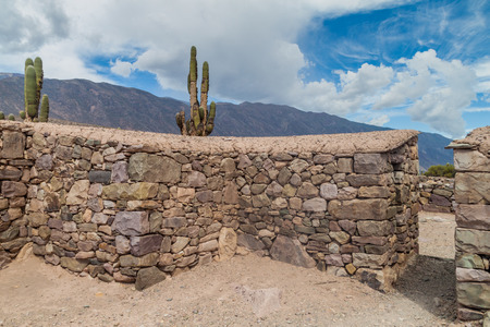 Ruins of pre-Columbian fortification Pucara near Tilcara village in Quebrada de Humahuaca valley, Argentinaの写真素材