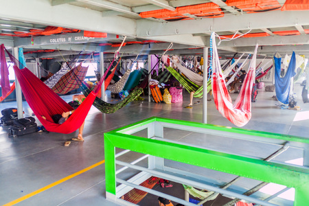 AMAZON, BRAZIL - JUNE 23, 2015: Passengers of hammock deck at the boat Diamante which plies river Amazon between Tabatinga and Manaus, Brazil.のeditorial素材