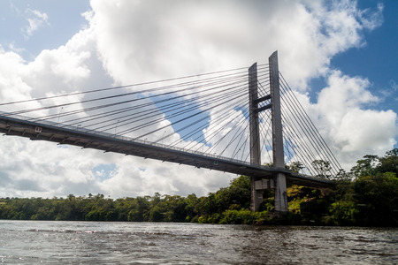 Bridge over river Oyapock (Oiapoque) between French Guiana and Brazilの写真素材