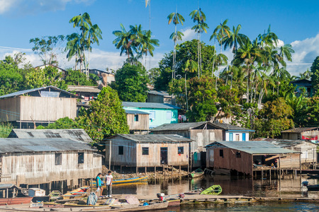 JUTAI, BRAZIL - JUNE 23, 2015: View of riverside buildings in Jutai town, Brazil.の写真素材