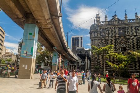 MEDELLIN, COLOMBIA - SEPTEMBER 1, 2015: Elevated metro line passes by Palace of Culture in Medellin.のeditorial素材