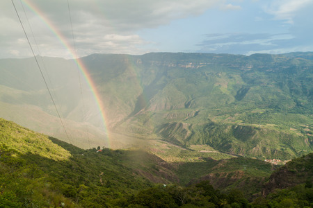 Rainbow in Chicamocha river canyon in Colombiaの写真素材