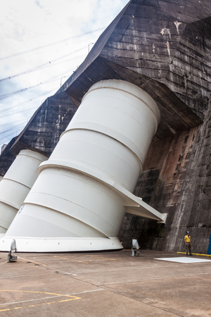 ITAIPU, BRAZIL/PARAGUAY - FEB 4, 2015: Giant penstocks of Itaipu dam on river Parana on the border of Brazil and Paraguayのeditorial素材