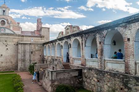 ALTA GRACIA, ARGENTINA - APRIL 3, 2015: Tourists visit a former Jesuit mission in Alta Gracia, Argentinaのeditorial素材