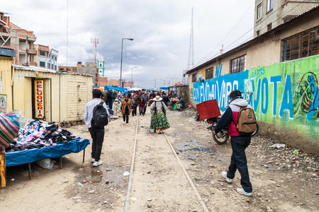 EL ALTO, BOLIVIA - APRIL 23, 2015: People shop at a market in El Alto, Bolivia.のeditorial素材