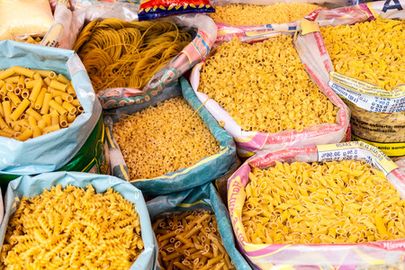 EL ALTO, BOLIVIA - APRIL 23, 2015: Different sorts of pasta at a market in El Alto, Boliviaのeditorial素材