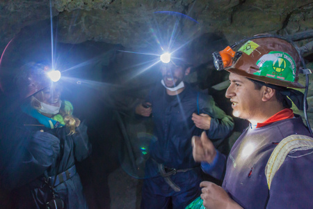 POTOSI, BOLIVIA - APRIL 20, 2015: Tourist guide with tourists inside Cerro Rico mine in Potosi, Bolivia.のeditorial素材