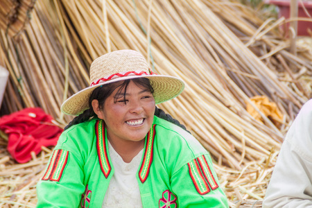TITICACA, PERU - MAY 15, 2015: Inhabitants of Uros floating islands, Titicaca lake, Peruのeditorial素材