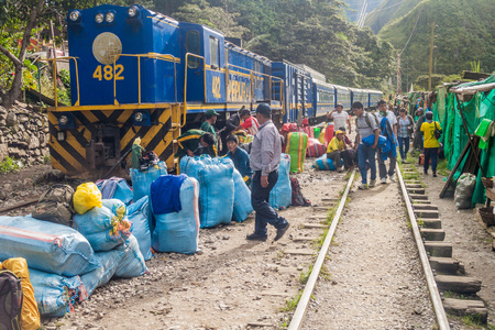 HIDROELECTRICA, PERU - MAY 17, 2015: Peru Rail train stops at the station Hidroelectrica in Urubamba river valley. Train head towards Aguas Calientes near Machu Picchu ruins.のeditorial素材