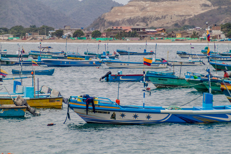 PUERTO LOPEZ, ECUADOR - JULY 2, 2015: Fishing boats in a port of Puerto Lopezのeditorial素材