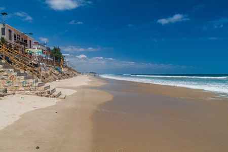 MONTANITA, ECUADOR - JUNE 30, 2015: Seaside promenade and a beach in Montanita town, Ecuador