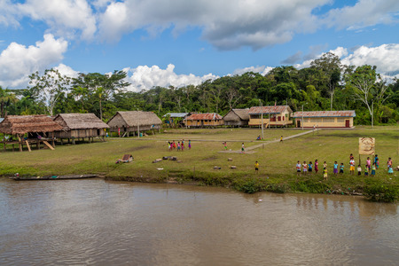 SANTA MARIA DE ANGOTEROS, PERU - JULY 15, 2015: View of a village Santa Maria de Angoteros on a river Napo.のeditorial素材