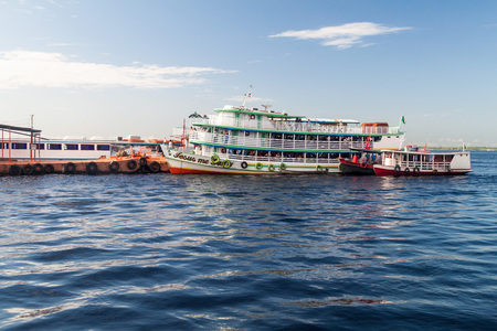 MANAUS, BRAZIL - JULY 27, 2015: River boats anchored at the passenger pier in Manaus, Brazilのeditorial素材