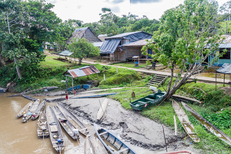 PANTOJA, PERU - JULY 12, 2015: Dugout canoes Peke Peke in Pantoja village, Peru PANTOJA, PERU - JULY 12, 2015: Dugout canoes Peke Peke in Pantoja village, Peru