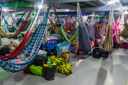 AMAZON, BRAZIL - JUNE 22, 2015: Passengers of hammock deck at the boat Diamante which plies river Amazon between Tabatinga and Manaus, Brazil.のeditorial素材