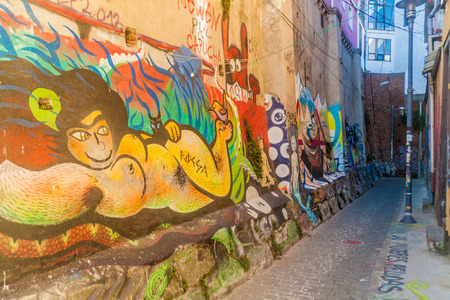 VALPARAISO, CHILE - MARCH 29, 2015: Houses covered under colorful graffiti in Valparaiso, Chileのeditorial素材