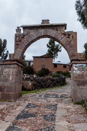 Stone gate in a village on Amantani island in Titicaca lake, Peruのeditorial素材