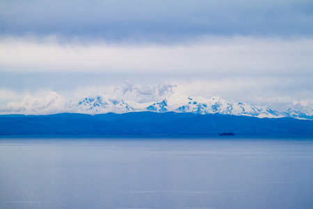 Cordillera Real mountain range behind Titicaca lake, Boliviaの写真素材
